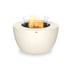 A bone-colored EcoSmart Fire Pod 40 propane fire pit with a glass wind guard, delivering an elegant flame display. This round propane fire pit is a freestanding fire bowl, perfect for enhancing any outdoor lounge or patio setup.