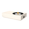 A bone-colored EcoSmart Fire Tequila 50 fire pit with a stainless steel burner, offering a modern and sophisticated look. This sleek, low-profile fire feature provides a warm, inviting ambiance, perfect for luxury outdoor spaces, hospitality environments, and contemporary backyard settings.