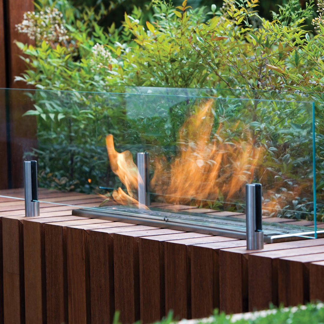 Close-up of EcoSmart Fire Twin Feet Fixings, showcasing precision-cut stainless steel brackets engineered for modern fire pit mounting. These high-quality brackets provide secure attachment for glass fire screens and enhance the stability of fire pit enclosures in contemporary outdoor and indoor spaces.