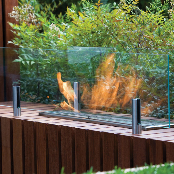 Close-up of EcoSmart Fire Twin Feet Fixings, showcasing precision-cut stainless steel brackets engineered for modern fire pit mounting. These high-quality brackets provide secure attachment for glass fire screens and enhance the stability of fire pit enclosures in contemporary outdoor and indoor spaces.