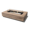 EcoSmart Fire Wharf 50 Teak fire pit table with a stainless steel burner and protective glass wind guard, creating a contemporary focal point for outdoor living areas. The sleek teak wood frame adds natural elegance, making it a stylish choice for luxury patios, outdoor lounges, and modern fire pit setups. This natural gas or propane fire pit produces a clean-burning flame for sophisticated entertaining spaces.

