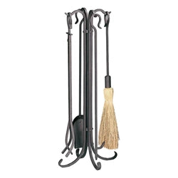 Wrought iron fireplace tool set featuring a stand, poker, tongs, shovel, and brush. Designed for durability and functionality, perfect for maintaining and managing indoor fireplaces