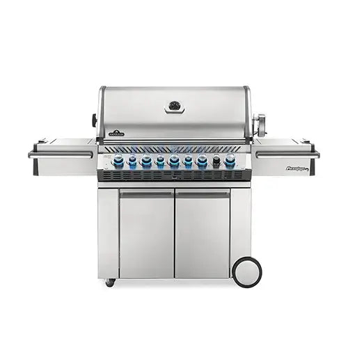 a very large BBQ gas grill is installed on a modern grill cart with giant wheels for portability and two side burner areas are displayed on a white background to create the ultimate outdoor cooking experience