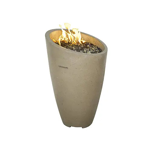 a tall stone fire column filled with mixed fire glass is lit and presented on a white background