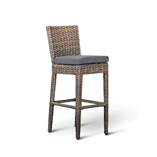 a wicker bar chair stands up on a white background