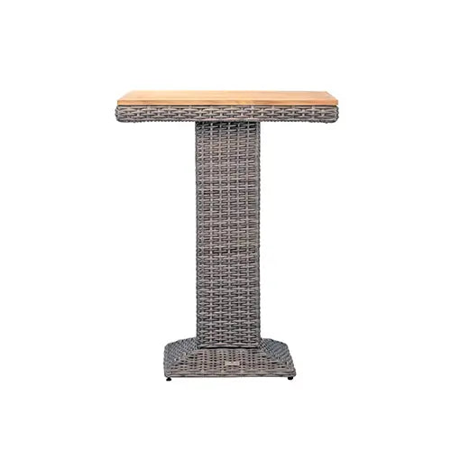 A wicker bar table with a wooden table top stands up on a white background