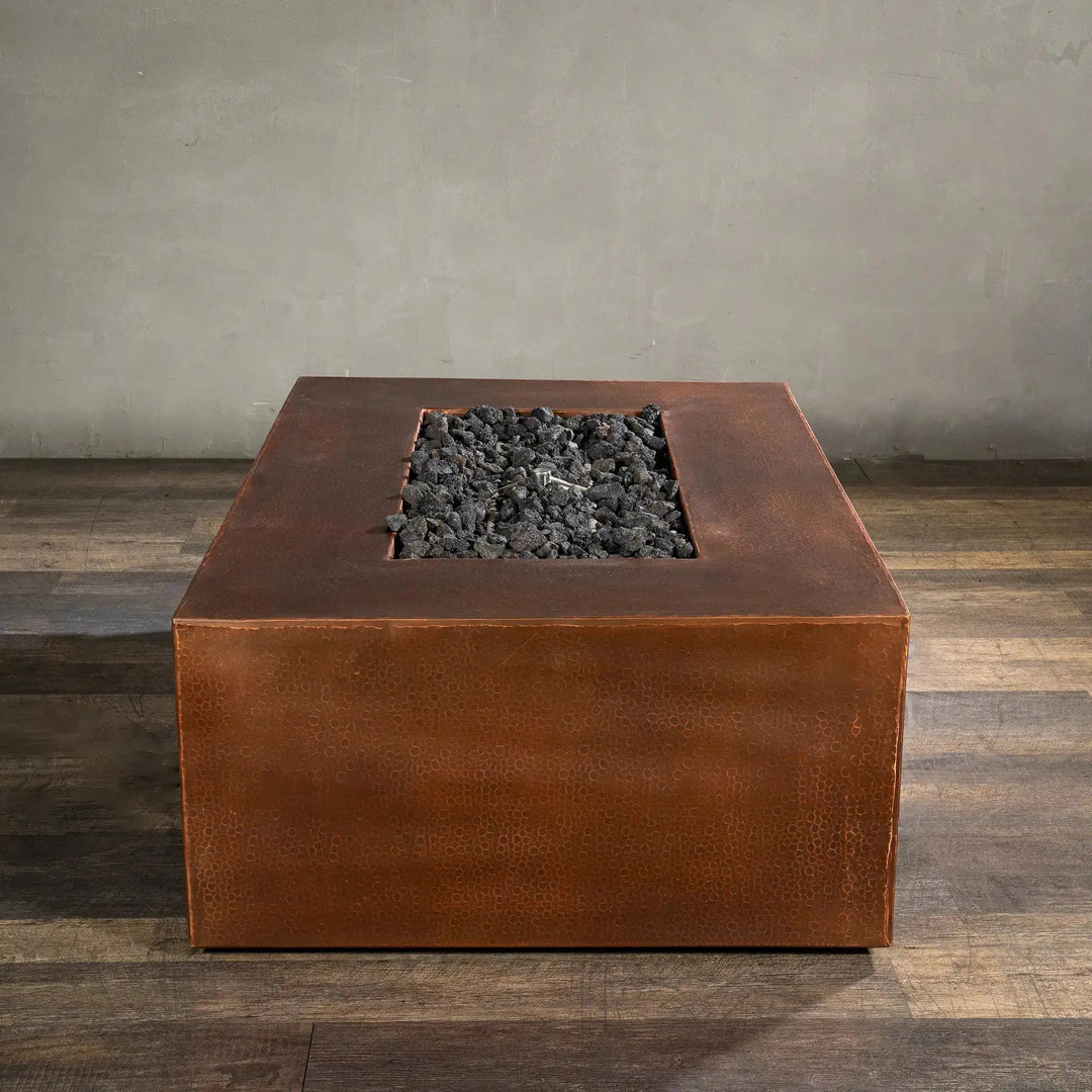 Gravity Moreno 48x32 rectangle copper fire pit unlit, highlighting the modern copper design and clean edges, perfect for enhancing an outdoor patio or backyard space