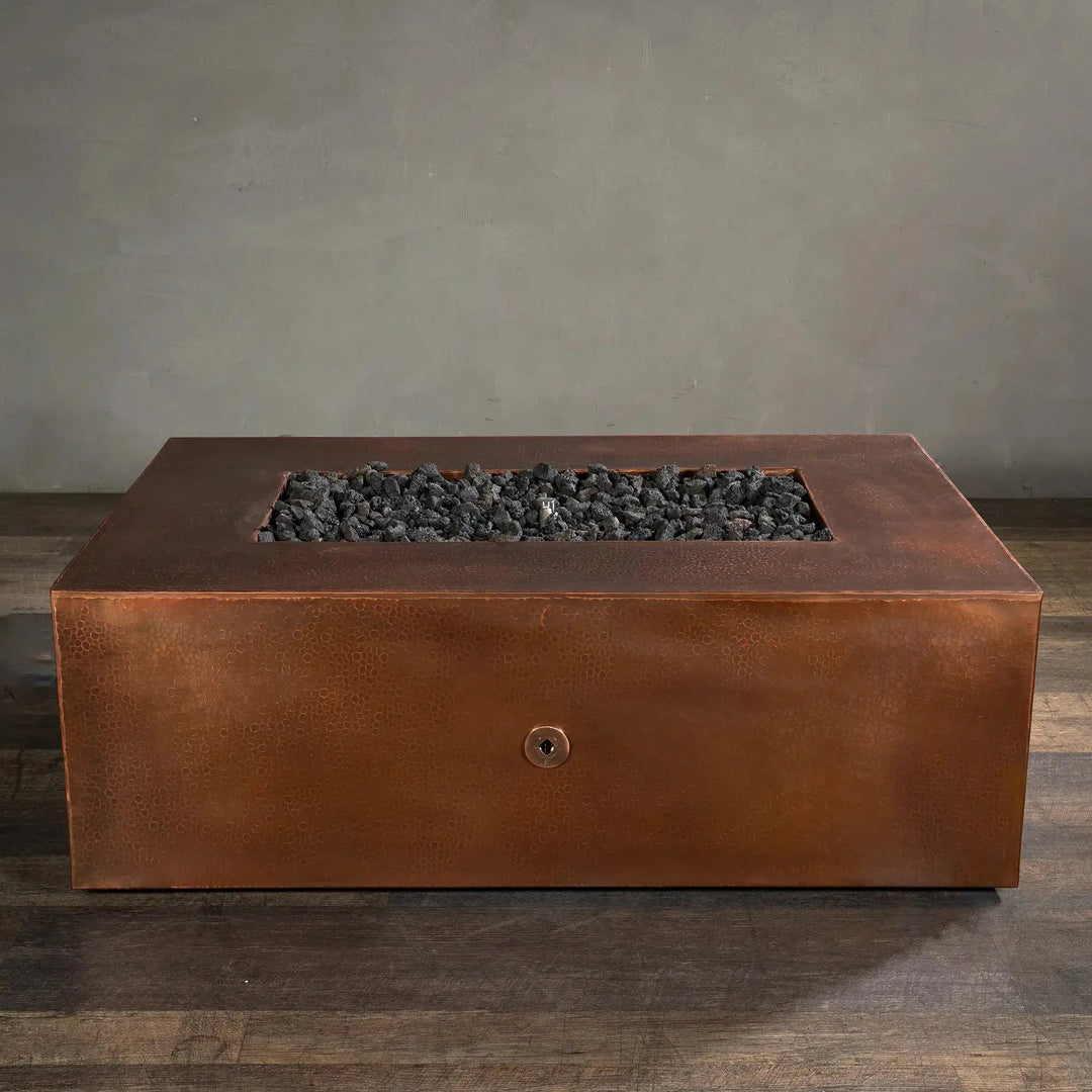 Gravity Moreno 48x32 rectangle copper fire pit unlit, showcasing the detailed copper finish and modern rectangular design, ideal for an outdoor patio fire pit setup