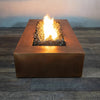 Front view of the Gravity Moreno 72x38 copper fire pit by Starfire Designs, showcasing a centered flame surrounded by dark lava rocks, perfect for contemporary outdoor spaces