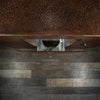 Top view of the Gravity Moreno copper fire pit by Starfire Designs showing the detail of the opened propane tank door with hammered copper finish