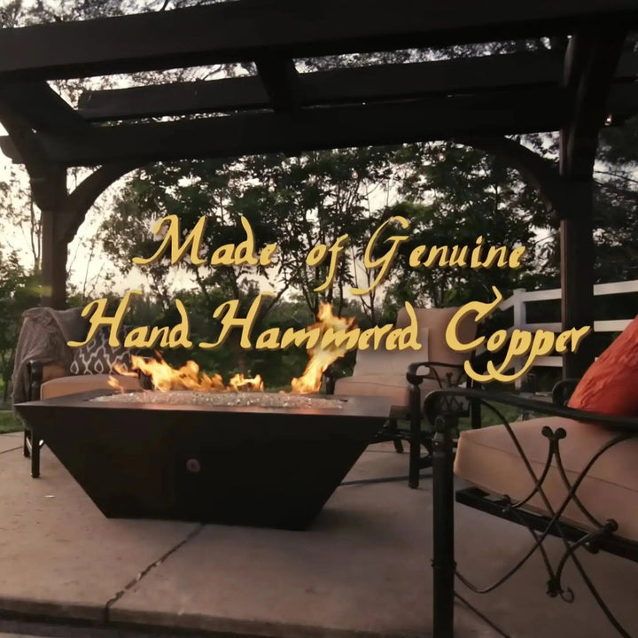 Largo Moreno 60-inch x 26-inch Rectangle Copper Fire Pit, featuring genuine hand-hammered copper craftsmanship under a pergola
