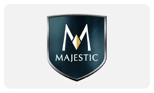 The Majestic Fireplaces logo featuring the brand name in green, white, and gold with a stylized shield icon, representing their premium fireplace inserts and whole units products.