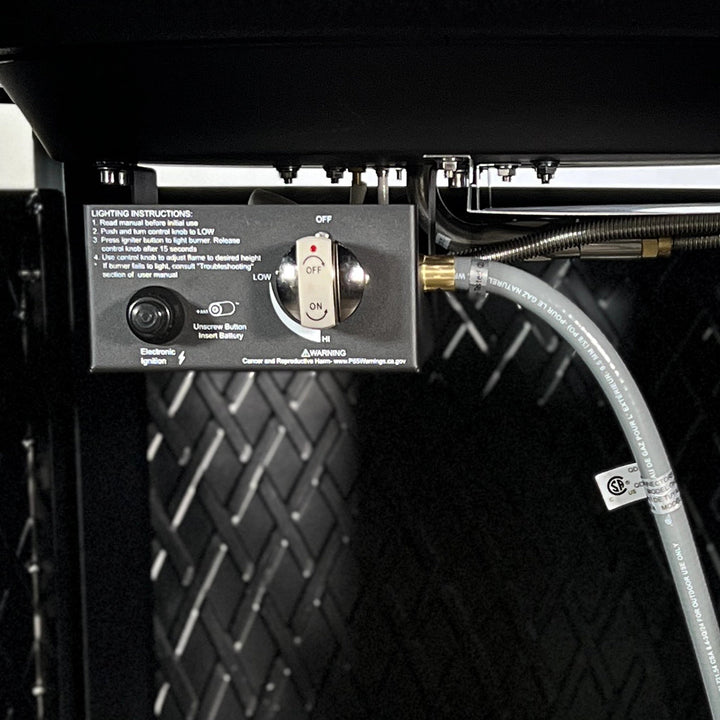 Close-up view of the Golden Flame Malibu 44” Round Cast Aluminum Natural Gas Fire Table’s control panel with electronic ignition and adjustable flame height for easy operation.