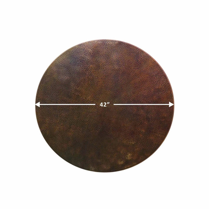 A close-up image displaying the unique hammered copper texture of the Moreno 42" round fire pit lid. The handcrafted detailing of the copper surface shows individual variations, making each lid a unique work of art. This image emphasizes the lid's intricate design, perfect for enhancing outdoor fire pit aesthetics.