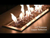 A modern linear fire pit filled with American Fire Products 1/4" Copper Reflective Fire Glass, glowing with dynamic flames that dance across the rich amber-toned glass—blending radiant warmth and contemporary elegance for a luxurious outdoor ambiance.