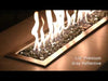 Modern fire feature showcasing American Fire Products 1/4" Gray Reflective Fire Glass in action, with cool silver-gray glass pieces shimmering beneath a lively flame for a sleek, contemporary outdoor ambiance.