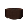 The Prism Hardscapes Cilindro Gas Fire Pit in a rich cafe color finish, featuring a low-profile cylindrical design with lava rock filling. This modern fire pit creates a warm, inviting outdoor ambiance, perfect for backyard, patio, or commercial fire pit installations. The smooth concrete texture complements various outdoor furniture and decor styles.