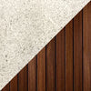 Close-up of the natural concrete finish of the Prism Hardscapes Fairmont Fire Table with wood panel details. This combination of light concrete and natural wood makes this fire table a perfect fit for any modern outdoor fire pit design. 