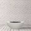 Prism Hardscapes Moderno 6 Gas Fire Bowl in an ultra-white finish, photographed in a minimalist studio. This clean and contemporary gas fire pit is a freestanding design ideal for upscale outdoor spaces, combining luxury and functionality for outdoor fire pit lovers