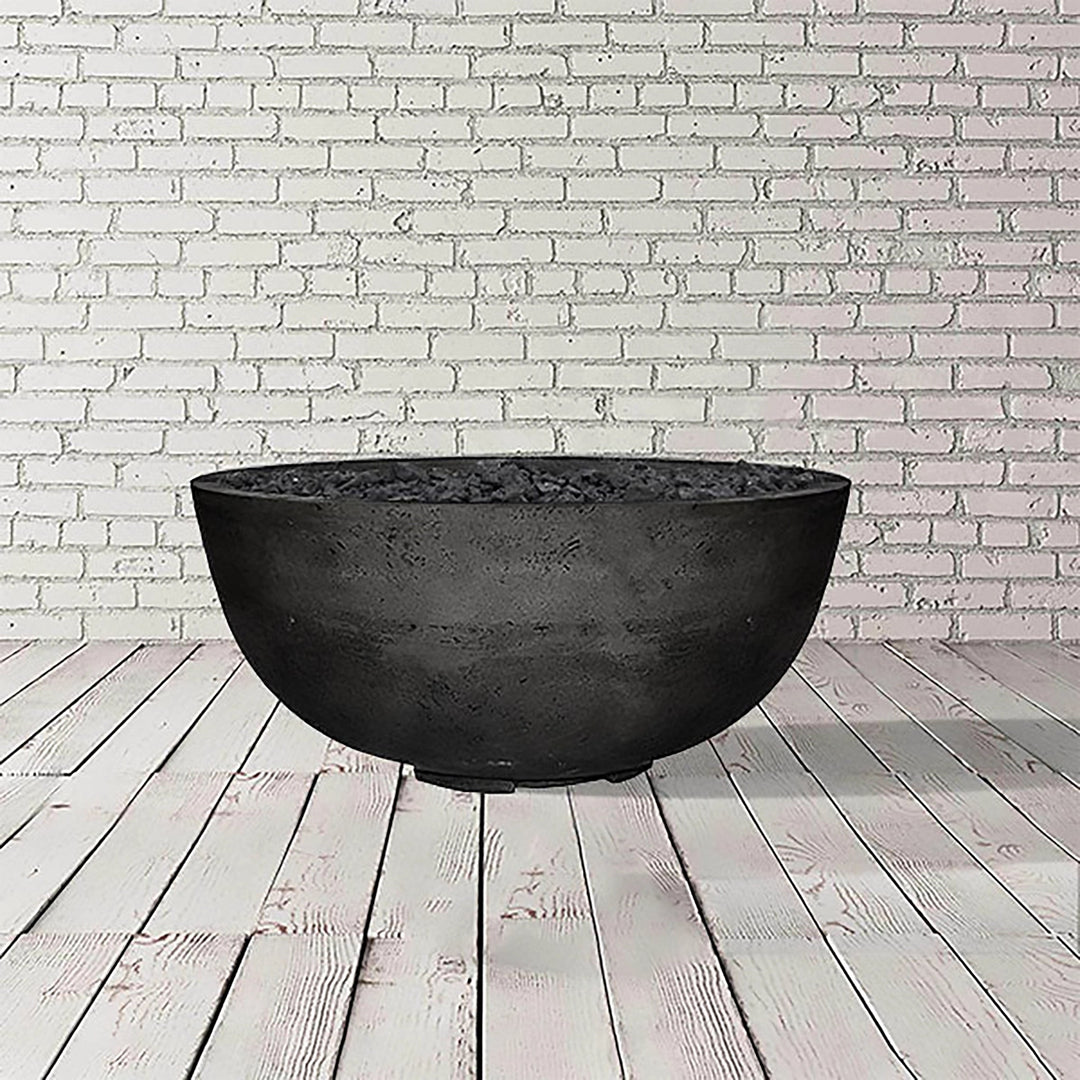 The Prism Hardscapes Moderno 1 Gas Fire Bowl in ebony, crafted with dark concrete, displays a bold and modern aesthetic. Perfect for outdoor fire bowls or fire pit tables, this large fire pit design creates a contemporary ambiance for your outdoor living space, making it an excellent addition to your backyard fire pit collection.