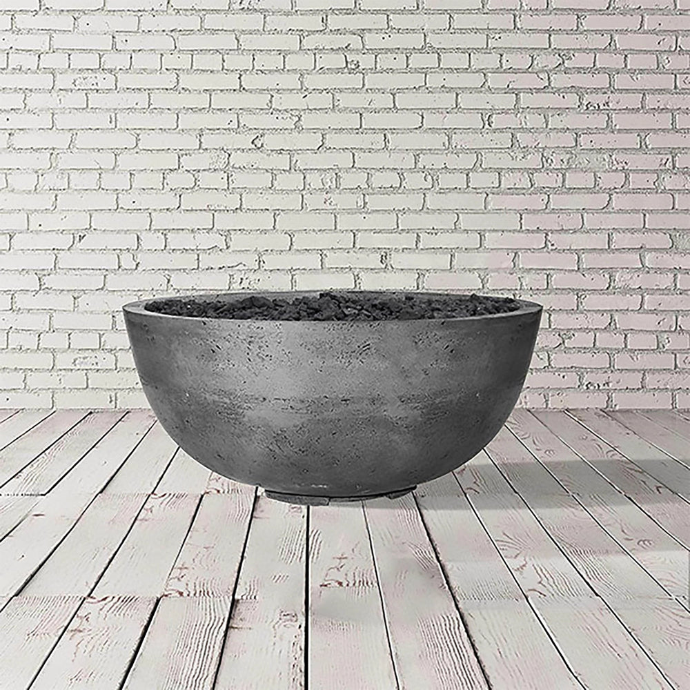 A light gray version of the Prism Hardscapes Moderno 1 Gas Fire Bowl in pewter. This outdoor fire pit boasts a durable concrete build with a smooth finish, suitable for both large outdoor fire bowls and more intimate fire pit tables. Its simple yet sophisticated design makes it a perfect fit for modern outdoor fire pits.