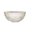 Prism Hardscapes Moderno 1 Gas Fire Pit in Natural, featuring a clean, minimalist round concrete design. This light gray fire pit is perfect for enhancing your modern outdoor space, whether it's a backyard, patio, or commercial area. Built from high-quality, weather-resistant materials, this natural-colored gas fire pit provides warmth and ambiance to any outdoor gathering.