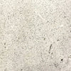 Prism Hardscapes Moderno 4 Gas Fire Bowl swatch in natural features a light gray concrete finish with speckled detailing, offering a minimalist and natural aesthetic. This versatile finish complements various outdoor patio styles, perfect for gas fire pit tables, round fire pits, and large backyard fire features. The natural concrete color provides a clean, timeless look for outdoor spaces.