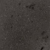  Detailed swatch of the Prism Hardscapes Moderno 5 Gas Fire Pit in ebony. The dark black finish adds a bold and contemporary element to any outdoor fire pit area. Ideal for luxury fire pits, large backyard fire pit designs, and modern outdoor fire tables.