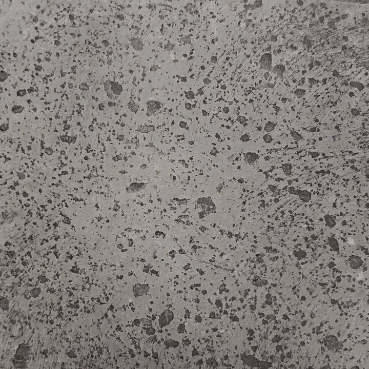 This close-up of the pewter finish on the Prism Hardscapes Pentola 3 Propane Fire Column shows the modern gray tones that add sophistication to any outdoor fire pit design. The textured concrete offers both durability and a stylish look for patios or gardens.