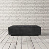 Prism Hardscapes Tavola 1 Gas Fire Pit in ebony, showcased in a studio setting with a modern aesthetic. The fire pit's rectangular shape and bold black finish make it a striking centerpiece for any outdoor patio or backyard. Designed with durable concrete materials and powered by a high-efficiency gas burner, this fire pit is both functional and stylish. Ebony finish enhances the fire pit's sleek, contemporary vibe. 