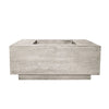 The Prism Hardscapes Tavola 42 Gas Fire Pit in natural gray offers a raw, minimalist design that blends seamlessly into any outdoor decor. The subtle concrete texture gives an industrial vibe, perfect for modern, urban-inspired spaces. This rectangular fire pit is both functional and stylish, providing warmth and ambiance for gatherings on cool evenings