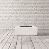 The Prism Hardscapes Tavola 42 gas fire pit in ultra white, offering a clean, minimalist design perfect for a contemporary outdoor setting. This fire pit adds a touch of luxury to any backyard patio, outdoor gas fire pit area, or modern fire table installation.
