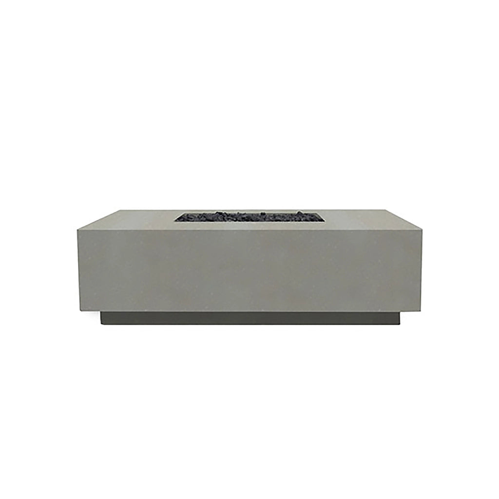 Prism Hardscapes Tavola 7 Gas Fire Pit in natural finish, featuring a natural concrete look that blends seamlessly with outdoor environments. The low-profile design and rectangular shape make this fire pit a centerpiece for patios or backyards. Designed for gas-fueled flames, it offers warmth and ambiance with a sleek, contemporary aesthetic. 
