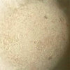 Natural color swatch of Rasmussen Alterna vent-free fireballs, offering an authentic stone appearance. This finish is suitable for ventless gas fireplaces, providing a raw, earthy feel to enhance a natural decor style