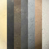 Rasmussen Alterna vent-free fire stones in a calico multi-color swatch, showcasing a mix of natural stone textures. This vibrant blend is ideal for gas fire pits, creating a unique and colorful ambiance for outdoor fire features.