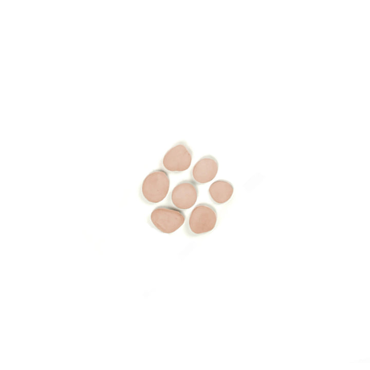 Rasmussen Vented FireStones assortment pack in beige, extra-small size. Perfect for creating a warm, earthy ambiance in any gas fire pit or fireplace setup. These realistic fire stones are crafted to enhance the appearance of flames, suitable for both outdoor and indoor use
