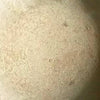 Swatch of Natural Rasmussen Vented Fire Stones, displaying an authentic texture that enhances the organic appeal of fire pits. Ideal for creating a rustic, earthy ambiance in outdoor fire settings
