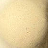 Rasmussen vented FireStones swatch in Beige, presenting a soft, neutral beige color with a fine-grained texture, suitable for natural gas and propane fire pits to create a warm, inviting atmosphere. Fireplace stones, fire pit decor, vented fire stones.