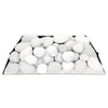 Front view of the Rasmussen Vented FireStones in white, showing a variety of round and smooth fire stones arranged on a sand-like bed. Perfect for outdoor fire pits, these vented stones provide a natural, elegant look for fire pits, fire tables, or fireplace displays. The white color adds a clean, modern aesthetic suitable for any backyard or patio.