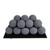 Rasmussen Vented Uniform FireBalls in dark grey placed on a black platform, arranged in a pyramid shape. These vented gas log alternatives provide a sleek and modern upgrade for fireplaces, made from heat-resistant material for long-lasting durability. Perfect for contemporary home décor with a gas fireplace or outdoor fire pit setup.