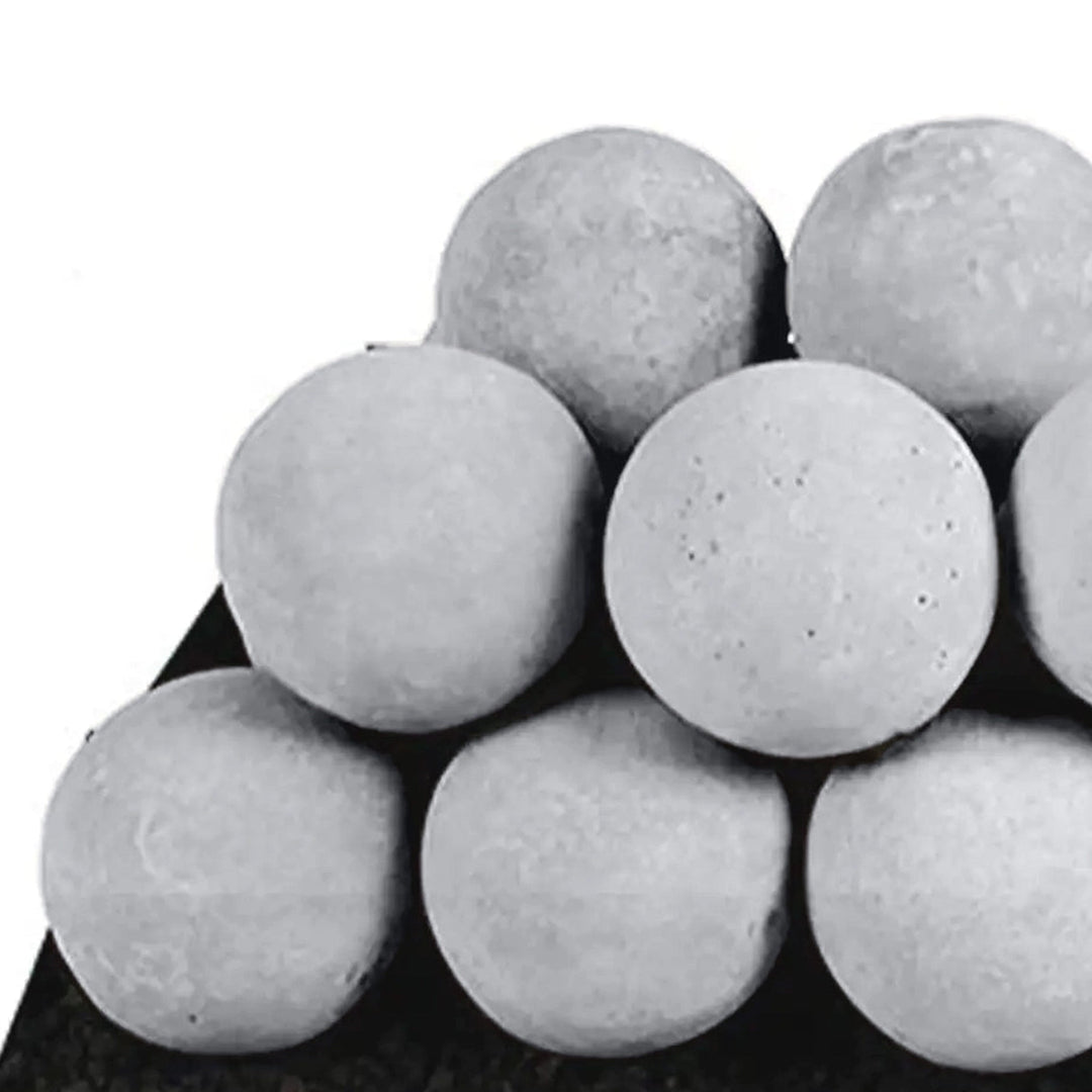 Close-up shot of Rasmussen Vented Uniform FireBalls in Light Grey. Arranged in a uniform stack, these light grey ceramic fireballs provide a subtle, modern touch to vented gas fireplaces. Their minimalist design and durable material make them an excellent alternative to conventional fire logs. Perfect for natural gas or propane systems, these fireballs elevate the fireplace’s overall aesthetic. 