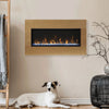 Remii Extra Slim built-in electric fireplace installed on a modern outdoor patio, surrounded by lush greenery and chic seating. Offering realistic flame visuals and a slim black frame, this fireplace provides warmth and style for covered outdoor living spaces.