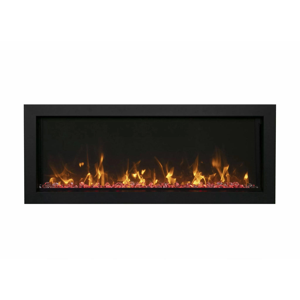 A sleek Remii Extra Slim indoor/outdoor built-in electric fireplace displaying realistic golden flames with vibrant orange ember bed. Ideal for modern indoor spaces or covered outdoor patios, this electric fireplace offers a minimalist black frame and slim profile for seamless wall integration.