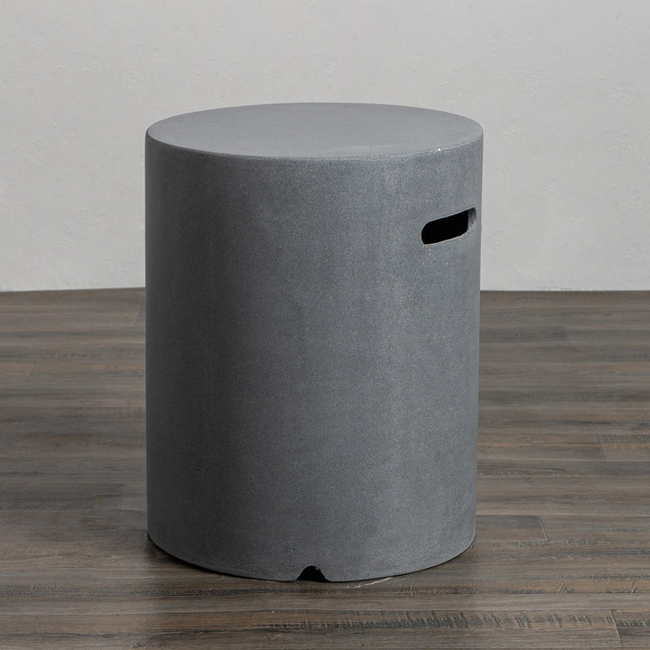 Close-up of the handle cutout on the Starfire Designs Beton 16" Natural Gray Round Propane Tank Cover, featuring precise craftsmanship and smooth edges. This durable and stylish cover is ideal for concealing propane tanks used with modern outdoor fire pits. Its natural gray tone complements various outdoor decors.