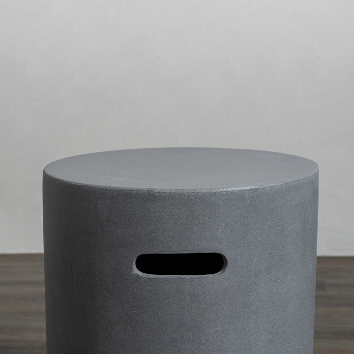 A detailed top-down view of the Starfire Designs Beton 16" Natural Gray Round Propane Tank Cover, showcasing its solid, flat concrete top with seamless edges. This propane tank cover is a versatile accessory for outdoor gas fire pits, blending durability with a sleek, modern design in natural gray.