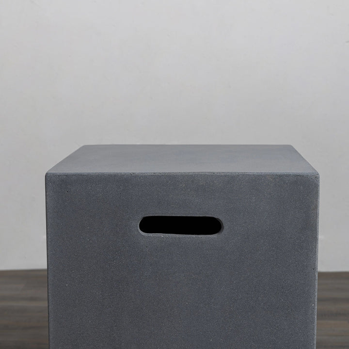 Close-up of the top section of the Starfire Designs Beton 16-inch Natural Gray Square Propane Tank Cover, highlighting its smooth texture and ergonomic hand slots. Designed for both utility and aesthetics, this cover is an essential accessory for concealing propane tanks while maintaining a polished outdoor setup.