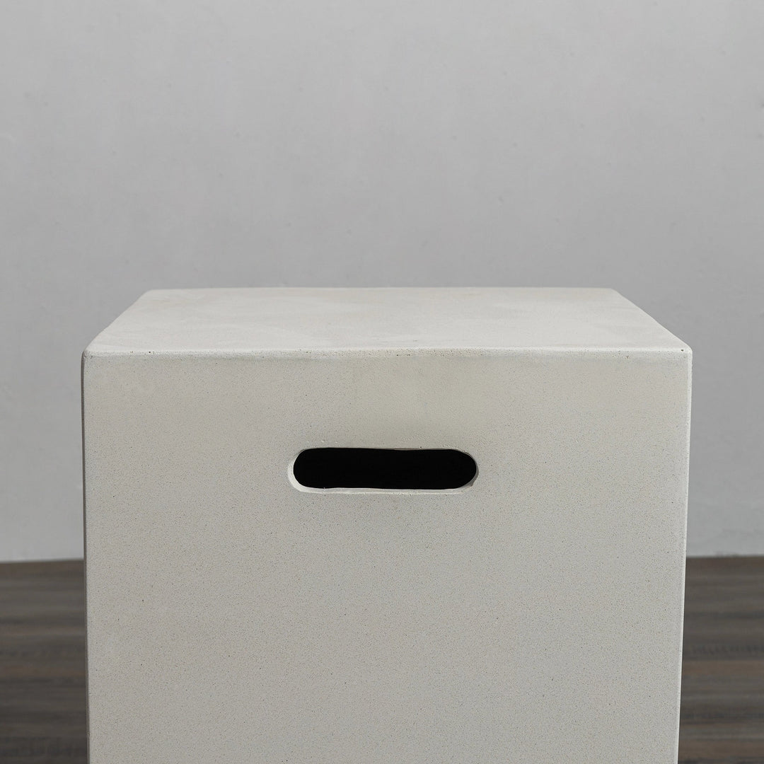 Close-up view of the Starfire Designs Beton 16-inch white square propane tank cover displaying its finely crafted concrete surface and smooth edges. Designed to keep propane tanks out of sight while maintaining a stylish outdoor setting.