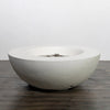 Side view of the Starfire Designs Beton 42 Inch White Round Concrete Natural Gas Fire Pit with Push Button Ignition, showcasing its smooth white concrete finish and sturdy round shape, perfect for modern outdoor spaces.