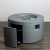The Starfire Designs Beton 42" Natural Gray Round Concrete Gas Fire Pit is shown with its access door open, revealing the hidden compartment that stores the propane tank or gas line connections. The premium stainless steel burner system is visible inside the smooth concrete fire pit structure.