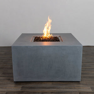 Front view of the Starfire Designs Beton 42" Natural Gray Square Hidden Propane Tank Gas Fire Pit, featuring a clean and modern square design with a durable concrete finish. The natural gray color complements outdoor spaces, showcasing its lava rocks and elegant flames. Ideal for patios and backyard gatherings.